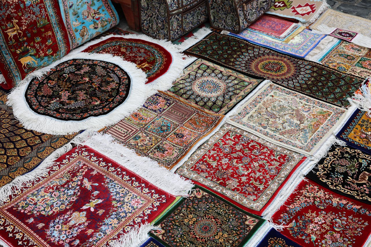 A vibrant collection of traditional Persian rugs showcasing intricate patterns and rich colors.