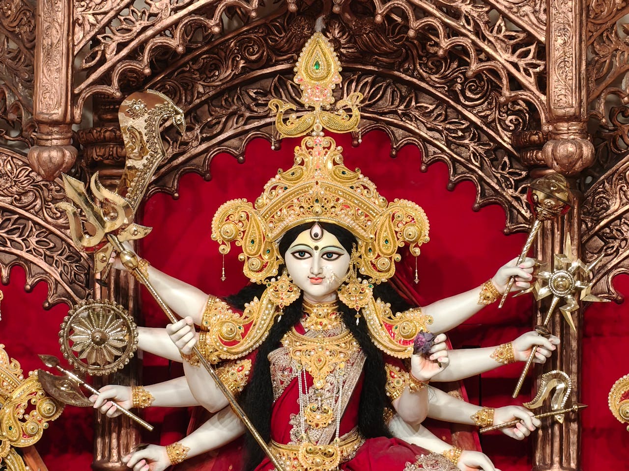 Intricate Durga idol showcasing divine elegance and traditional artistry during the vibrant Durga Puja festival.